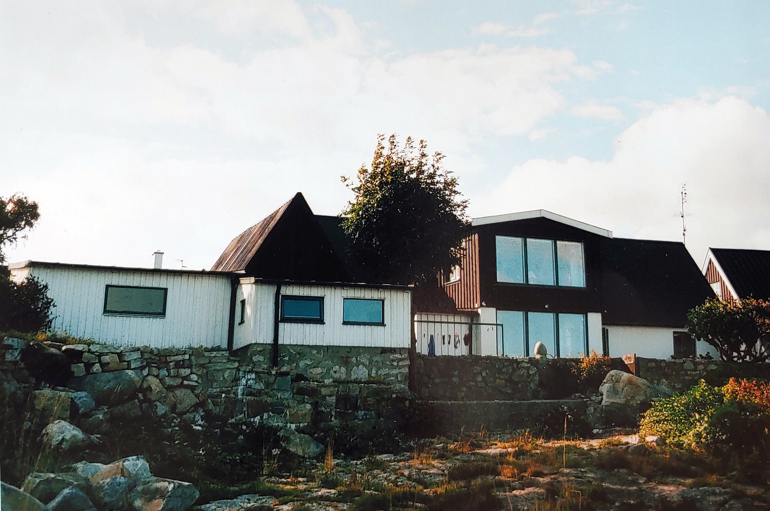House in Brantevik on Baltic Sea where Lisa grew up. Left is where buses were stored.